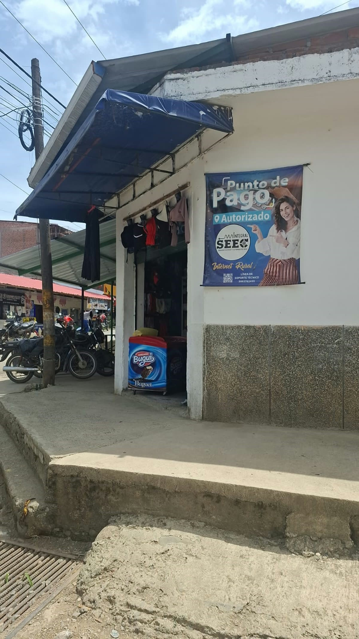 Fachada del punto de pago autorizado de Integral SEEC en Morales, Cauca, con aviso azul de Punto de Pago Autorizado